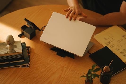 Clean laptop workspace supporting why speed-to-launch is the wrong KPI for Shopify launches