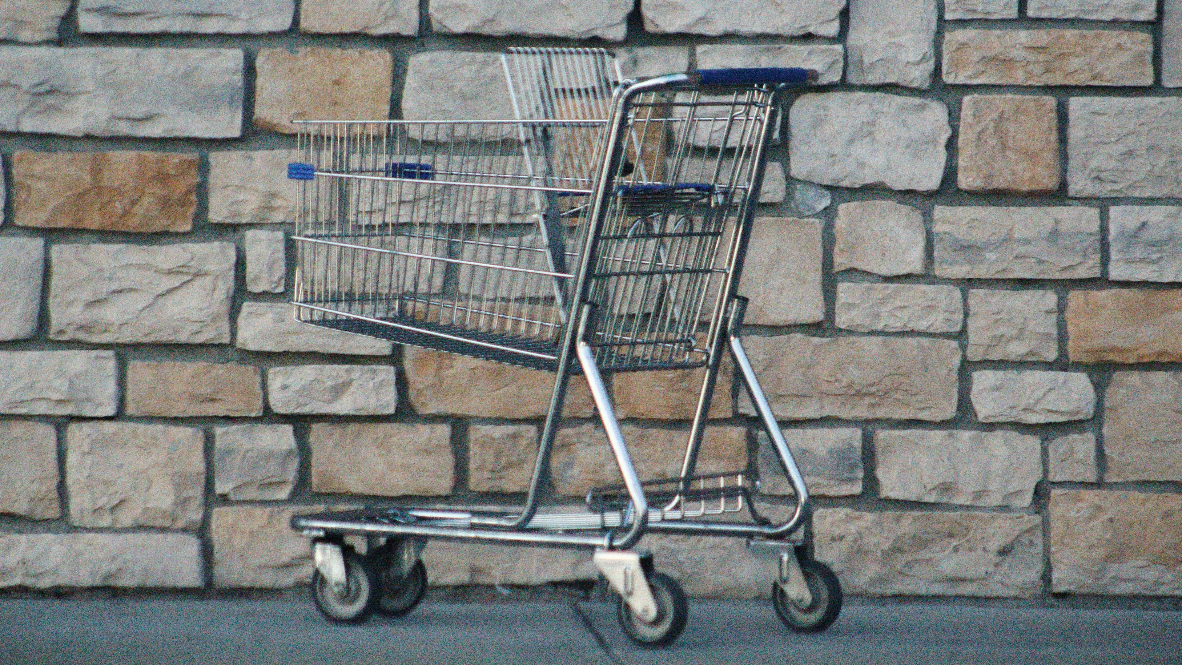 Empty shopping cart outdoors supporting flexibility tradeoffs and ongoing operational overhead in platform choice