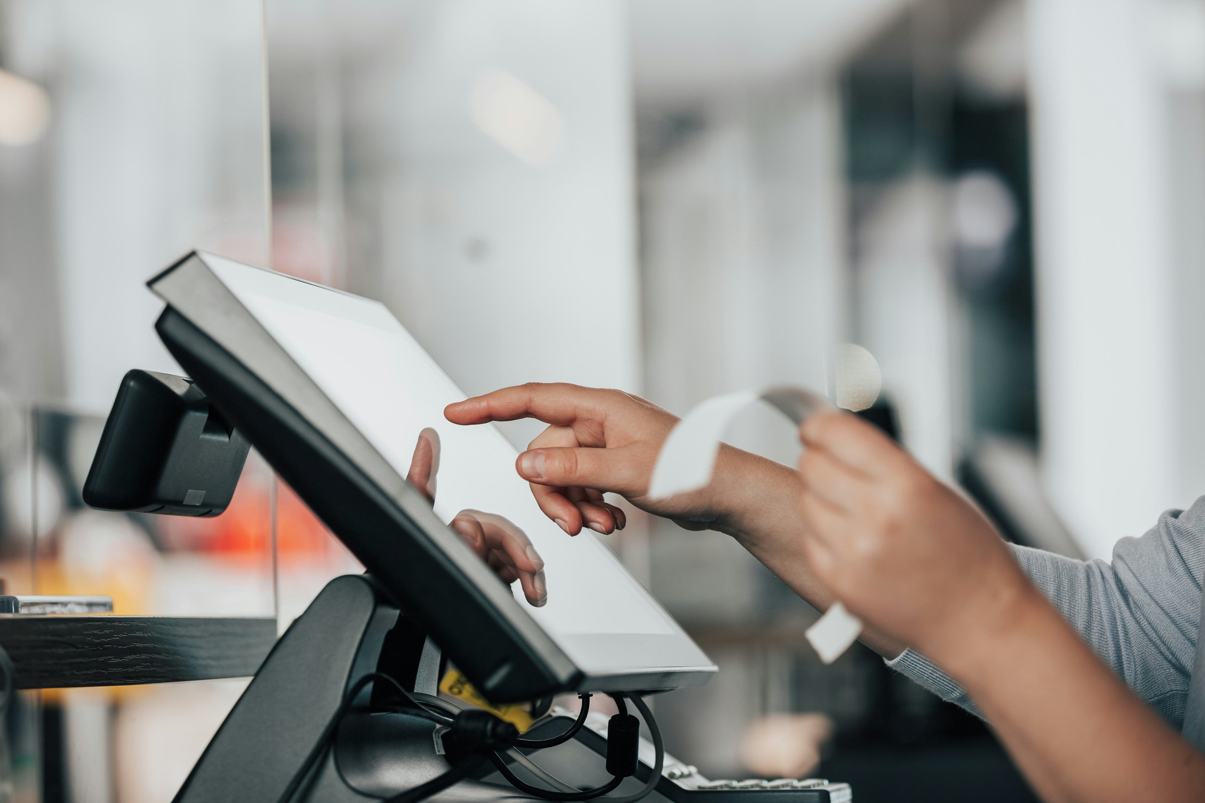 In-store POS checkout experience highlighting the shift brick-and-mortar brands face when moving online