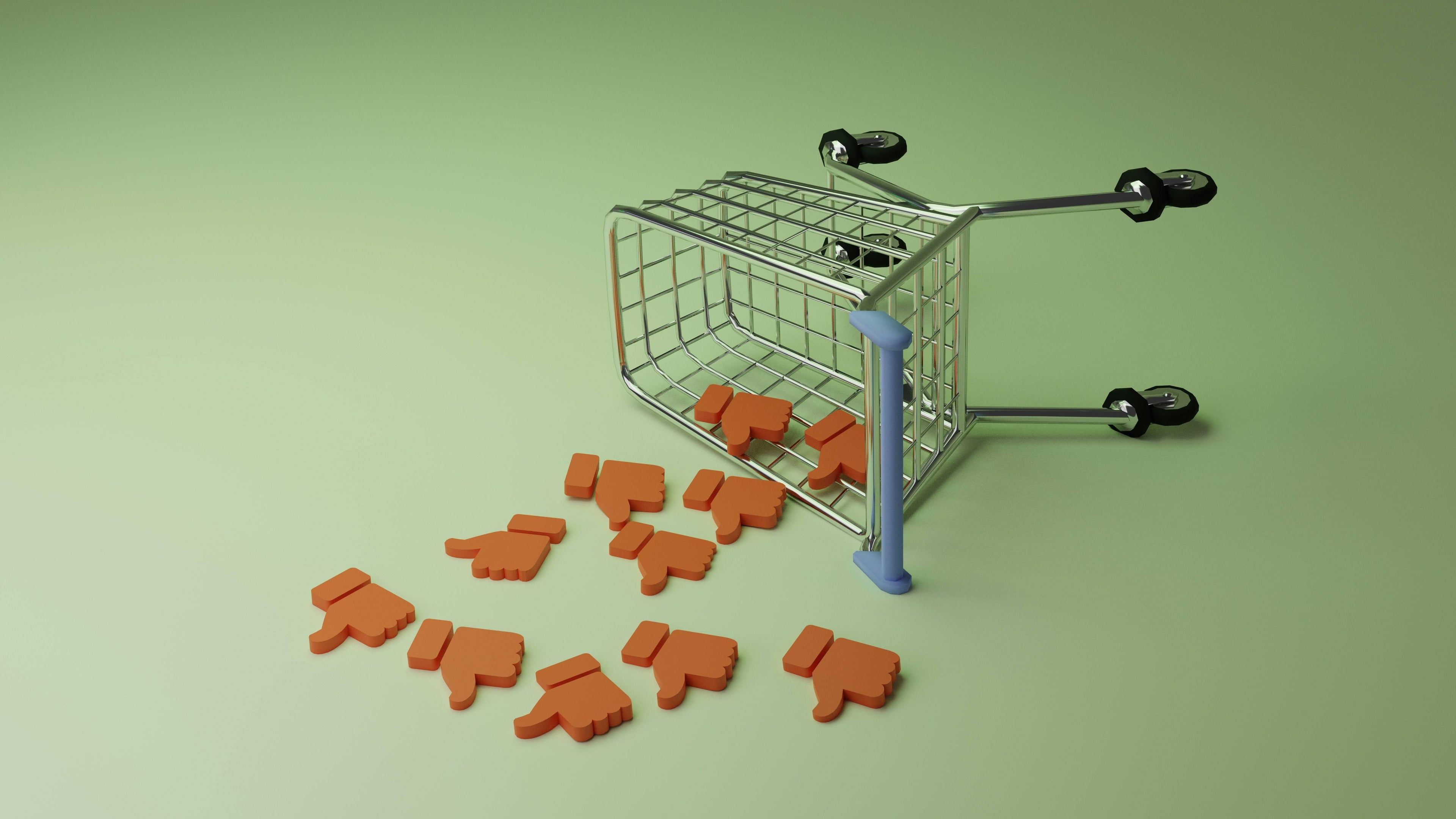 Tipped shopping cart with negative feedback icons supporting the risks of legacy architecture in modern ecommerce